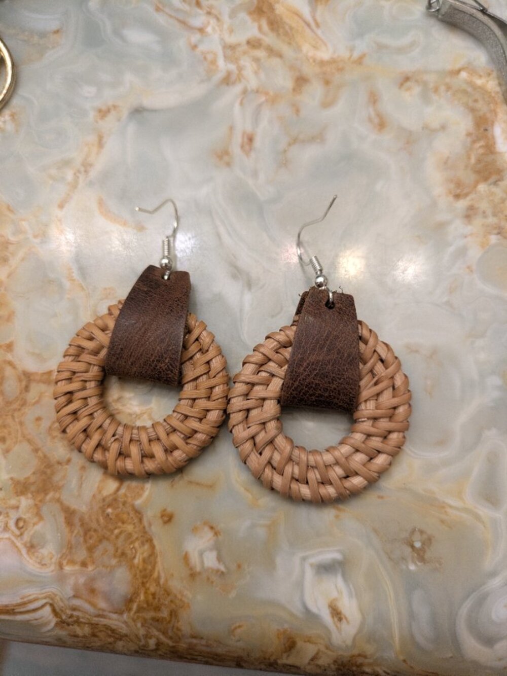 Rattan and leather circle earrings